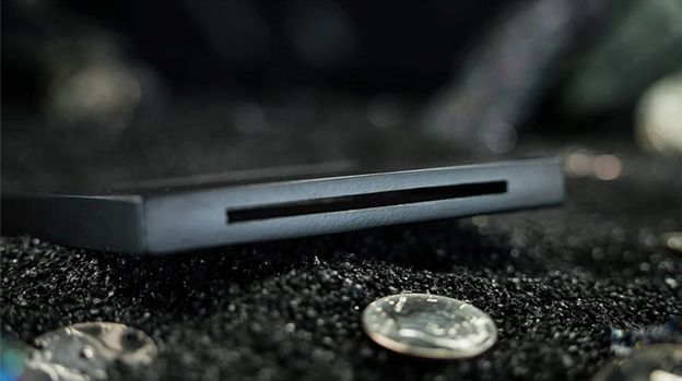 Coin Thru Anything by Nathan Kranzo